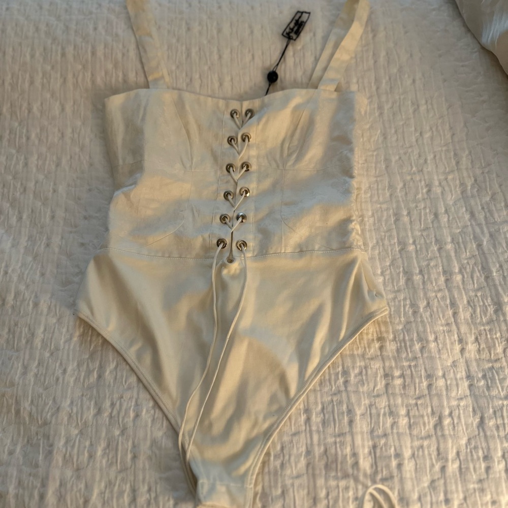 NWT For Love and Lemons cream corset bodysuit. Size S